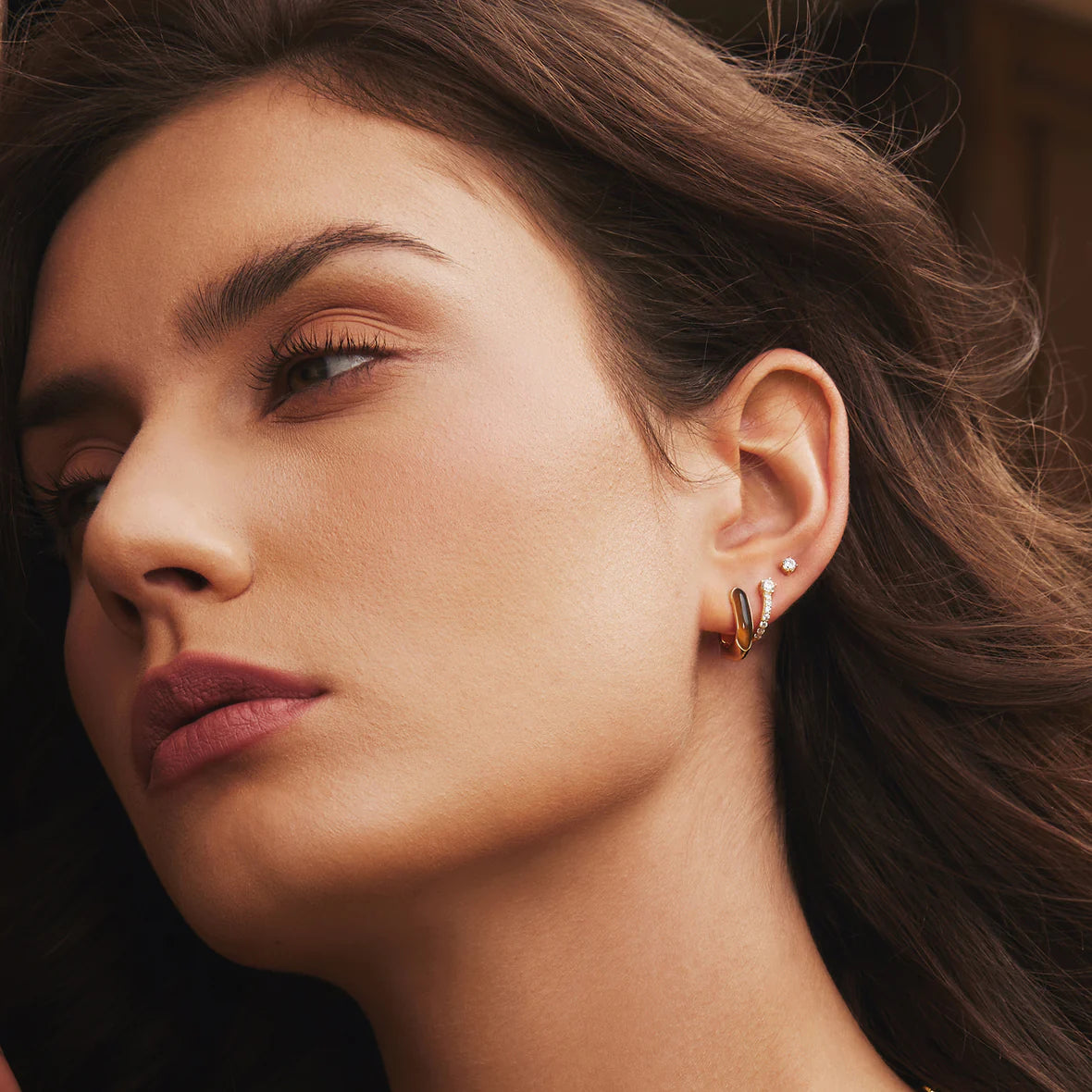MELODIC STAR HUGGIE HOOP EARRINGS
