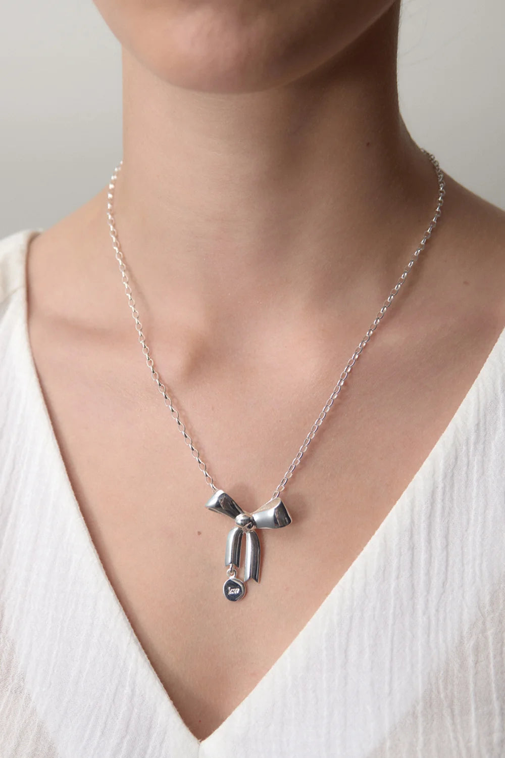 BOW PENDANT